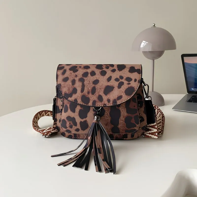 Cross Body Bag Saddle Style With All Over print And Tassel Stud Detail Leopard Print, Includes Wide Strap